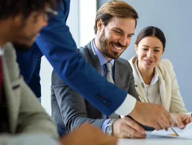 Sales team and company managers at an office meeting