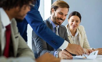 Sales team and company managers at an office meeting