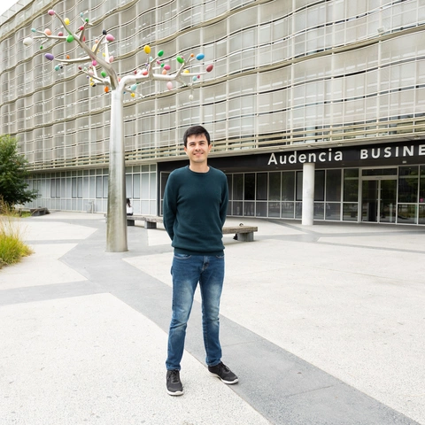 Summer Term student standing in front of Audencia Atlantic Campus