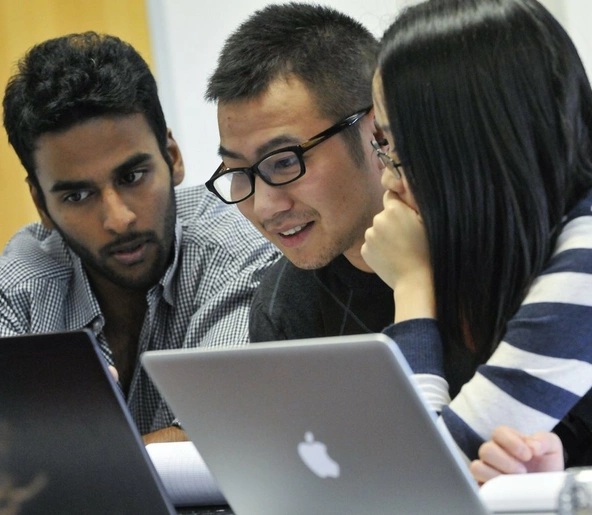 Three students working in a group